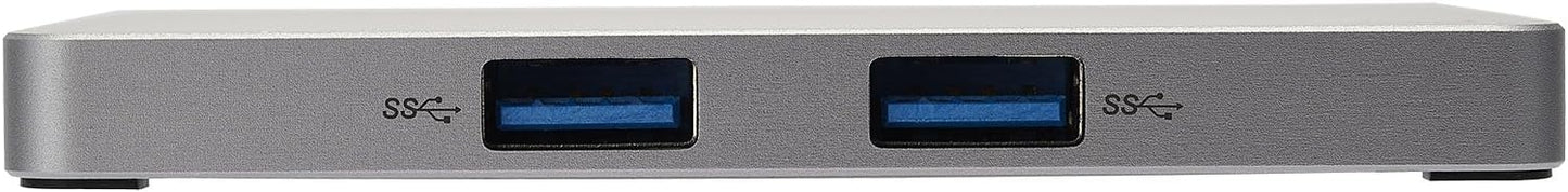 Silver USB-C hub with multiple ports on a white background
