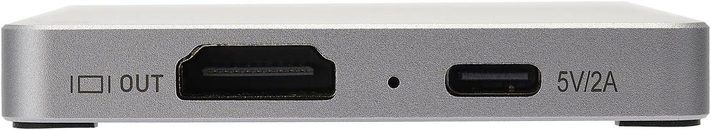 Close-up of a metallic device with ports and labels.
